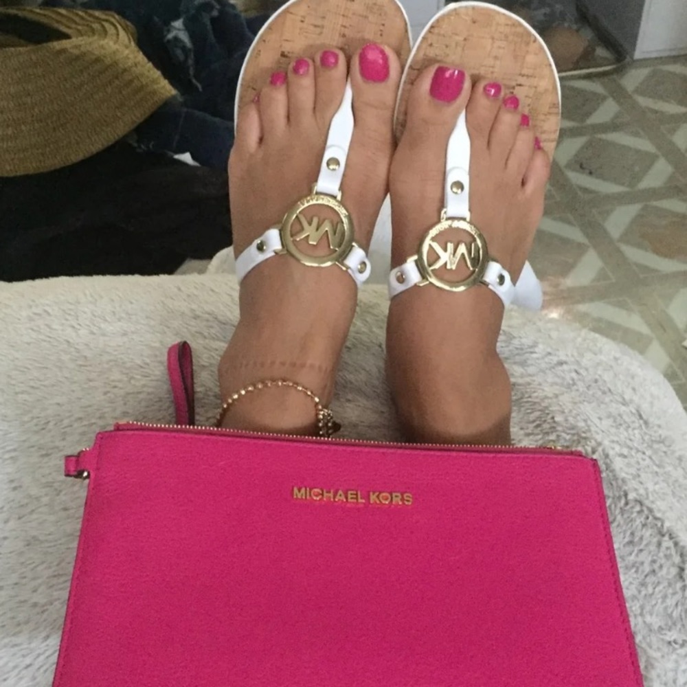 Beautiful hot pink MK clutch